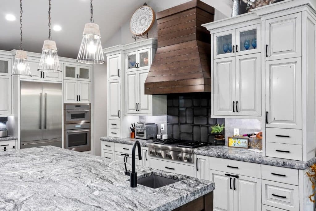 Bright white kitchen with dark copper accents