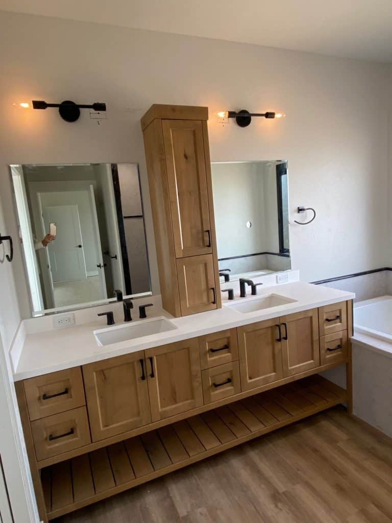 Bathroom with bright wood cupboards
